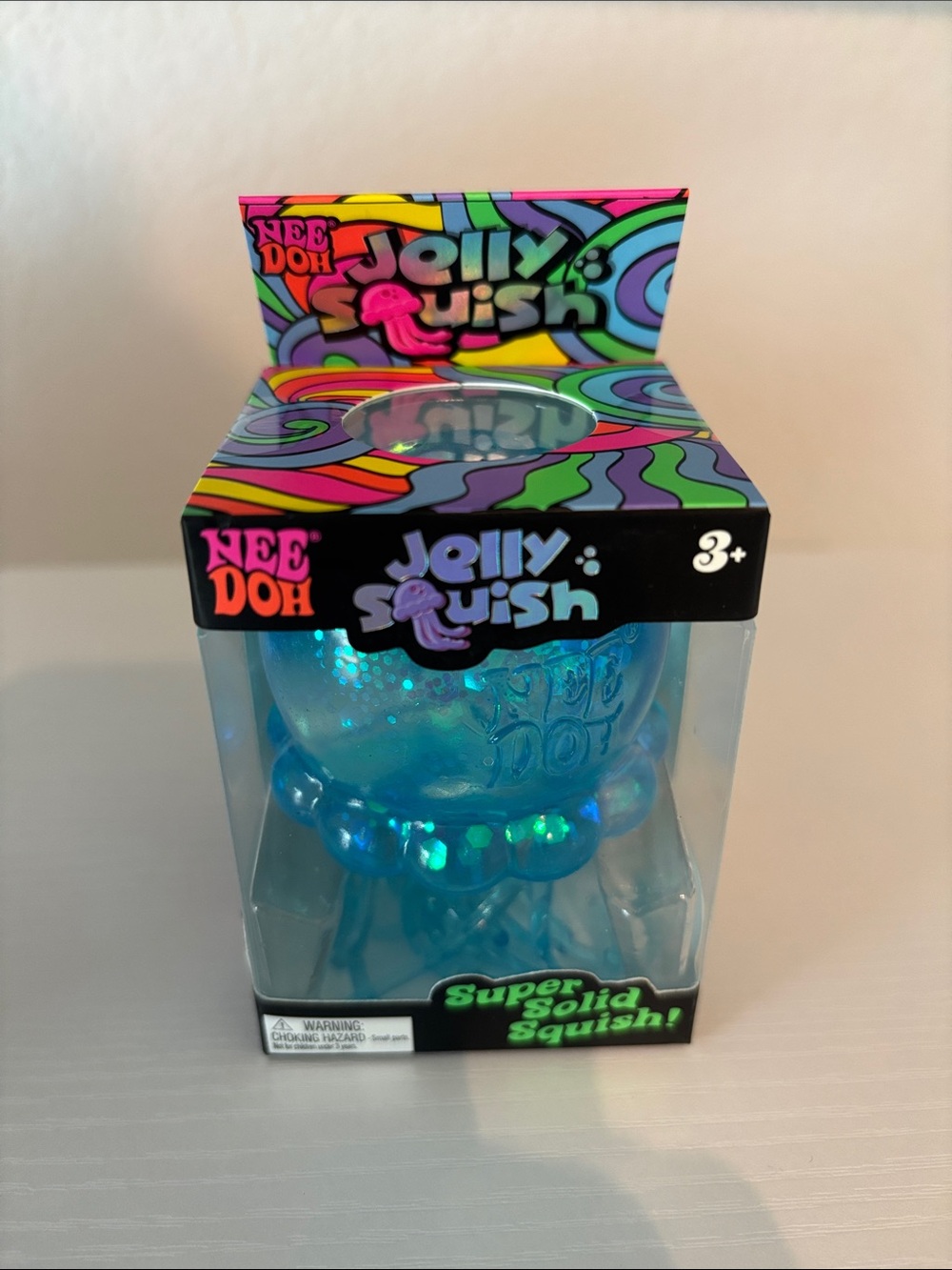 NIB Authentic Nee Doh Jelly Squish Blue Glitter Squishy Toy